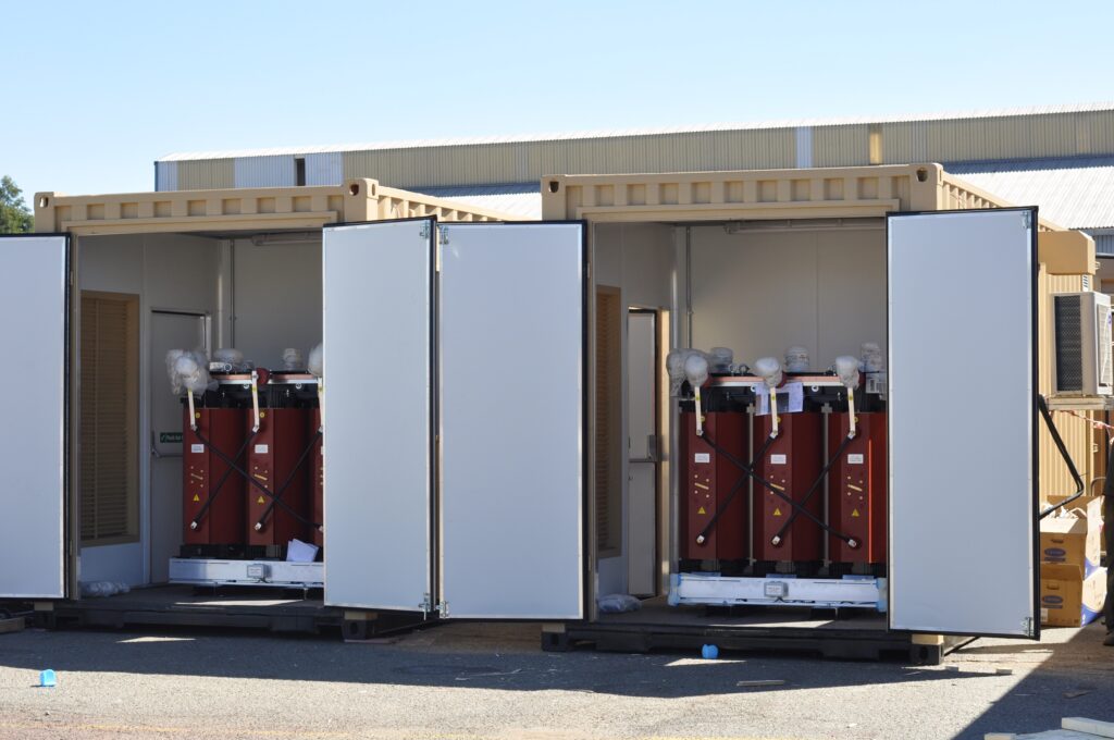 Custom designed and manufactured for specific site conditions, this solution shows multiple cast resin transformers in a specialised IP55 enclosure installed outdoor for a mining application.