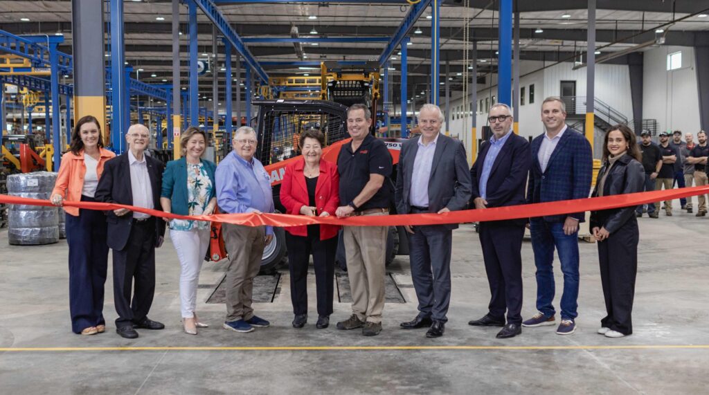 The ribbon cutting event was attended by several top executives.