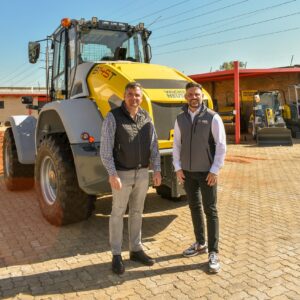 Dennis Vietze (right) and Stefan le Roux, in front of the new 8145T loader in the test pit at Wacker Neuson South Africa HQ in Robertville, Johannesburg.