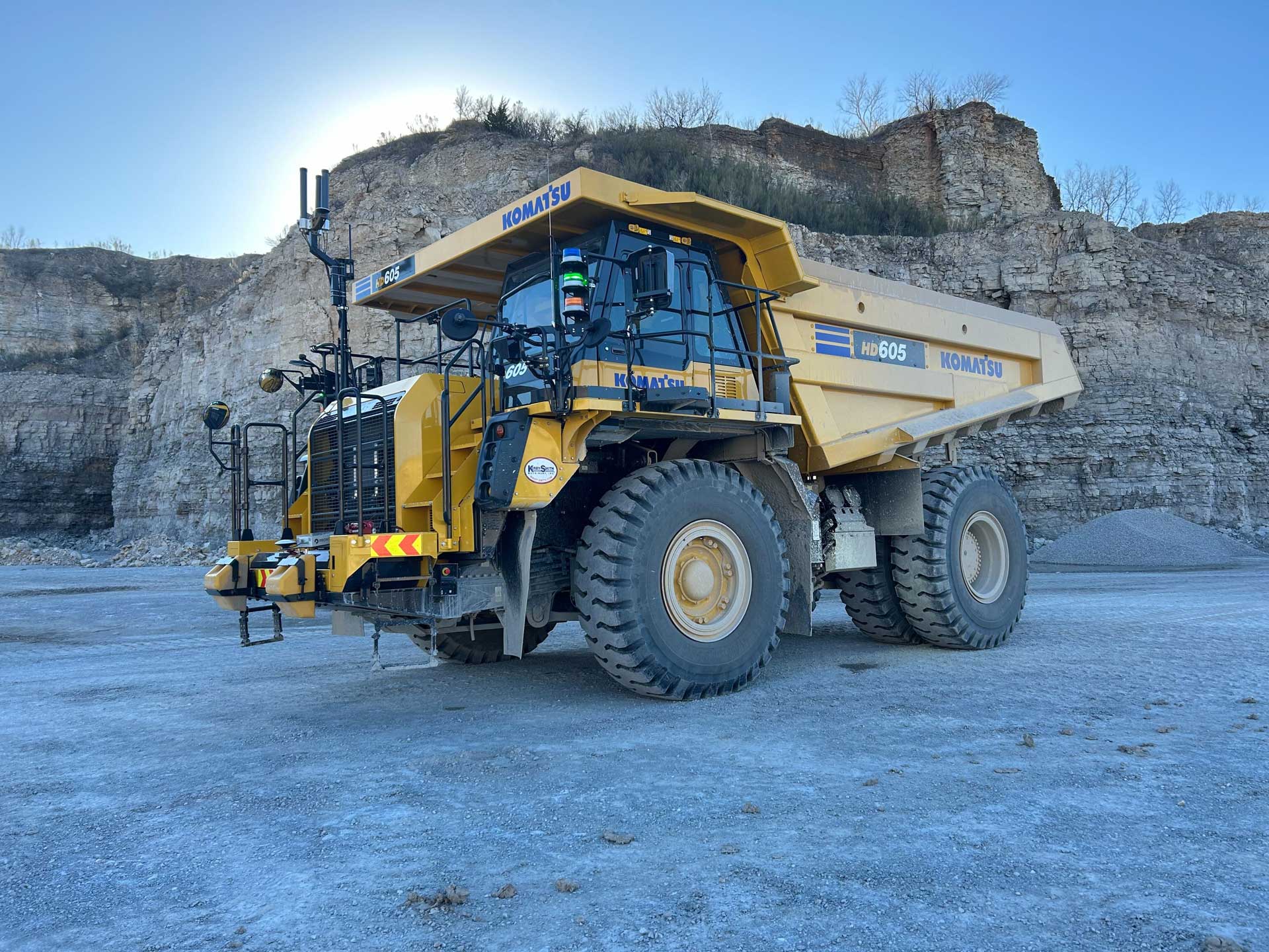 A Komatsu HD605-8 equipped with Pronto AHS operating at Heidelberg Materials’ Lake Bridgeport quarry in Texas.