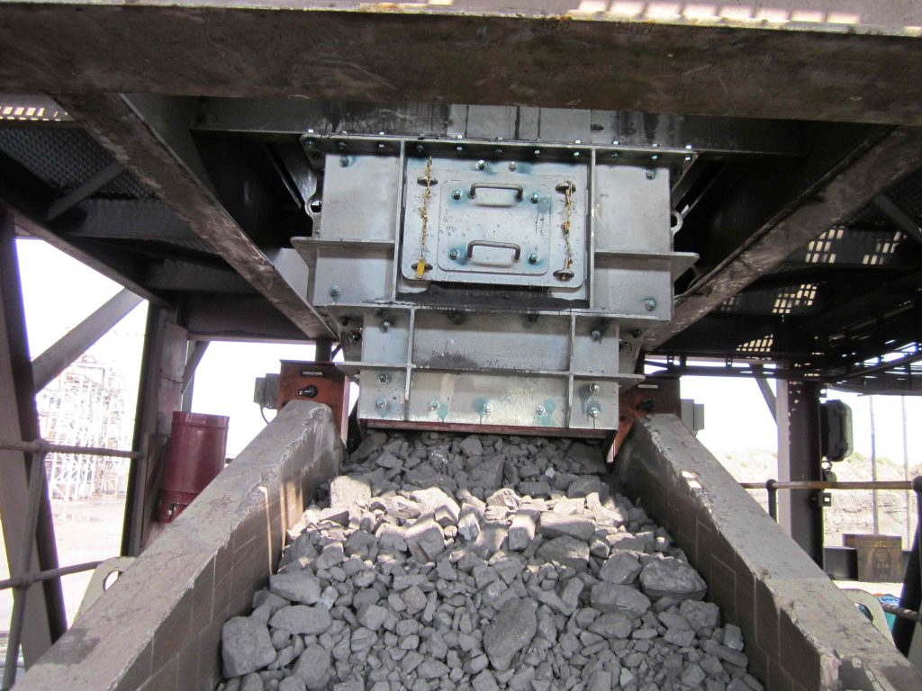 This custom engineered Weba transfer chute at a Northern Cape manganese mine resolved severe operational inefficiencies and reduced maintenance requirements.