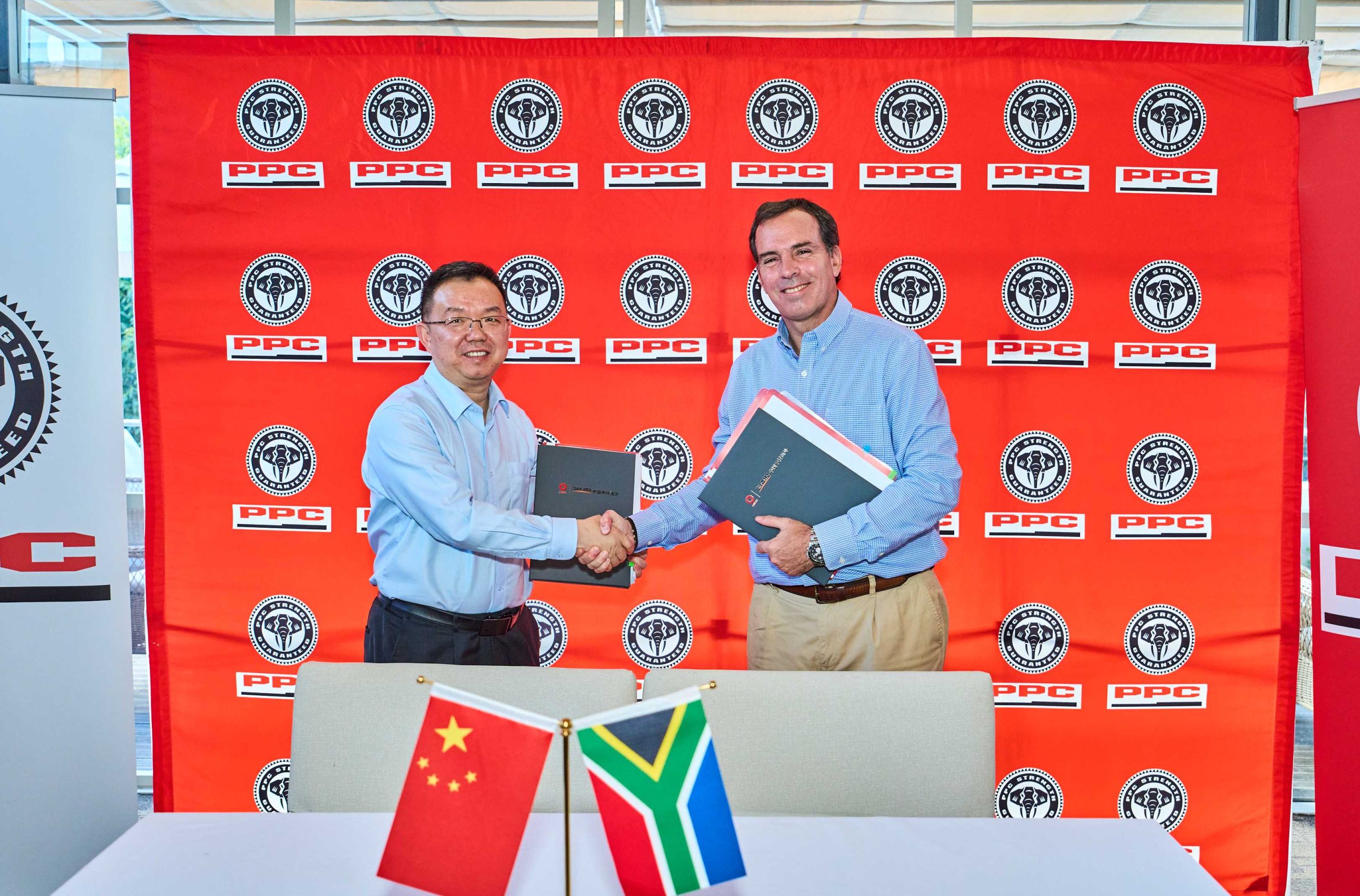 Zhu Linhe, Chairman at Sinoma Overseas Development (left) and Matias Cardarelli, PPC chief executive.
