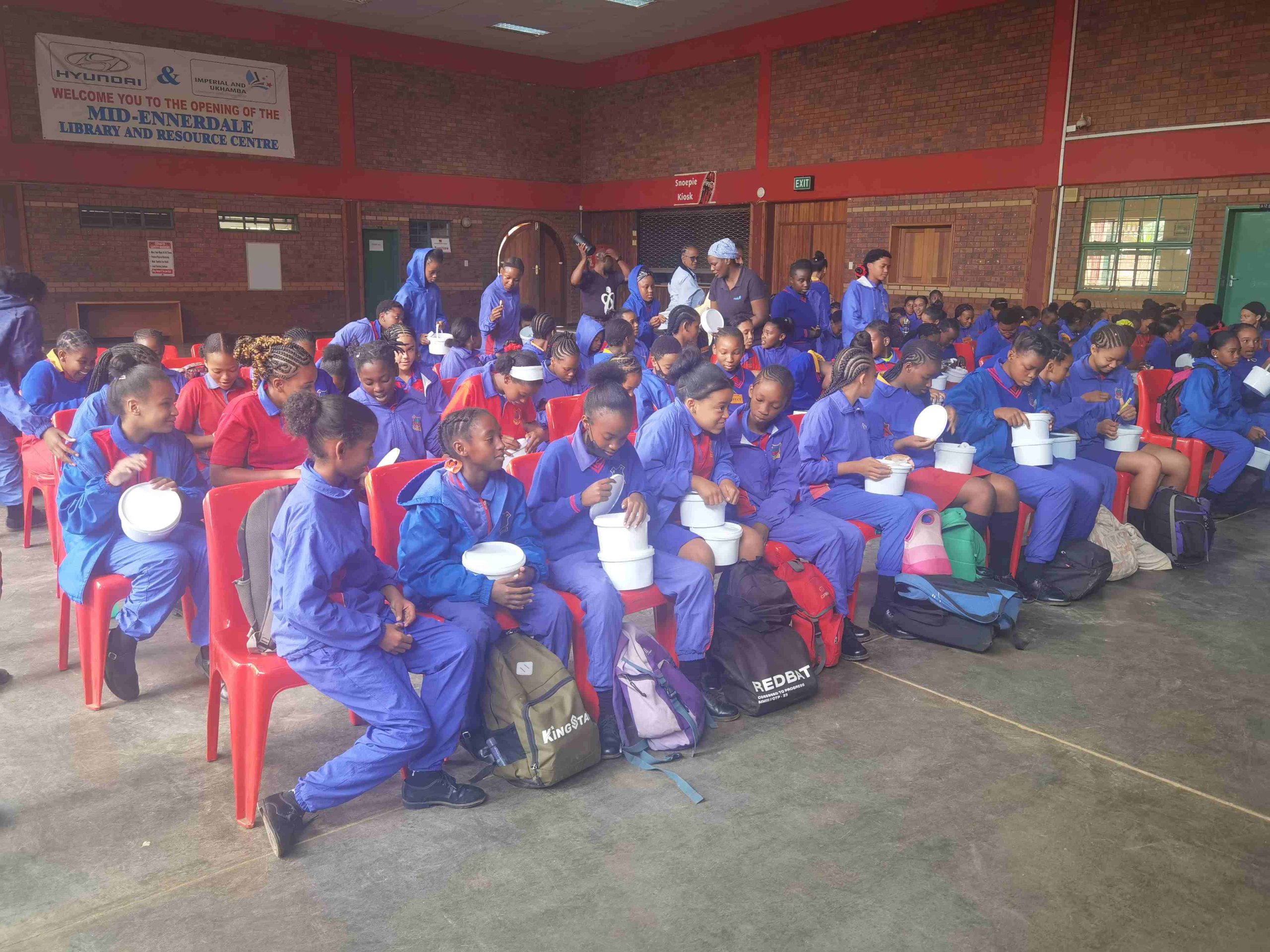 AfriSam, in partnership with RADA’s MiPad initiative, providing reusable sanitary pads to girls at the Mid-Ennerdale Primary School in Gauteng.
