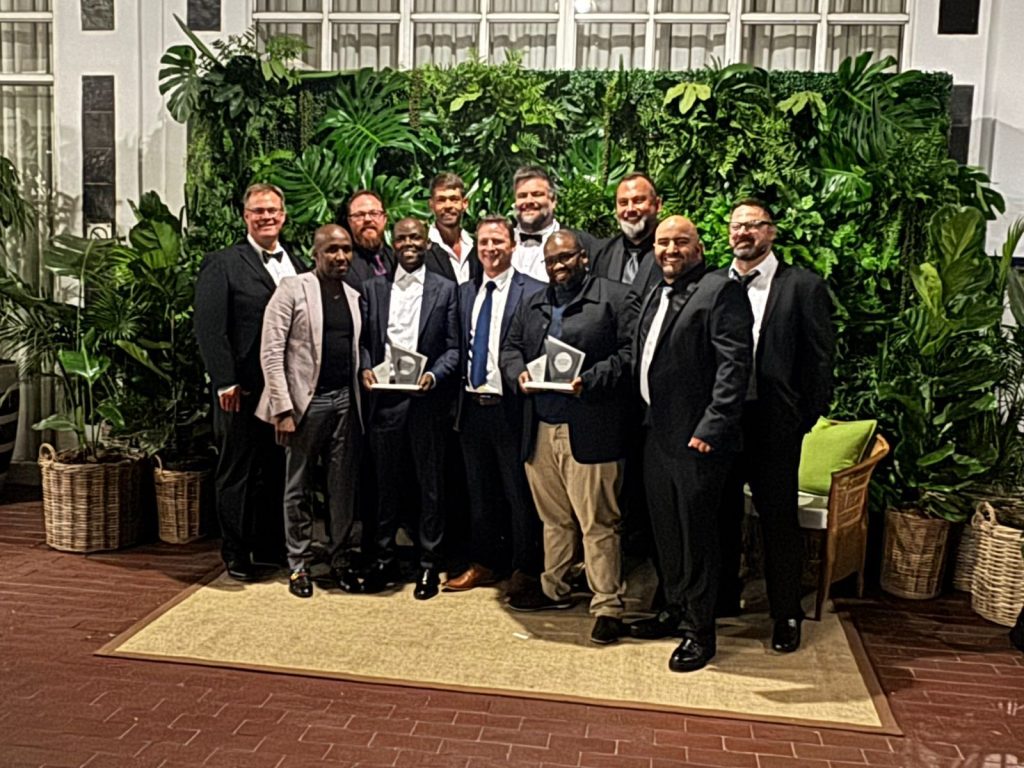 Representatives of Corestruc and its clients accept Fulton Awards for their projects.