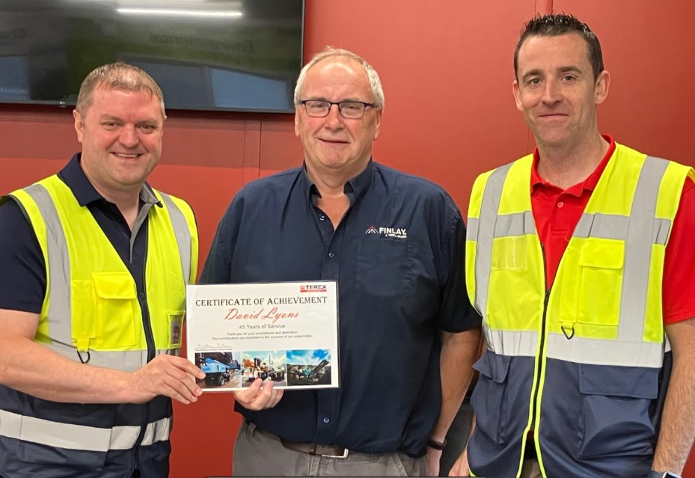 David Lyons (centre) receiving his 45 years of service award from Matt Dickson, GM of Terex Omagh (left) and Kieran McCrossan, Operations Director (right).
