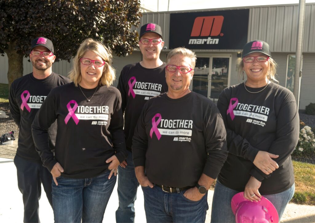One of the many Martin Engineering teams gear up with pink PPE to support the initiative.