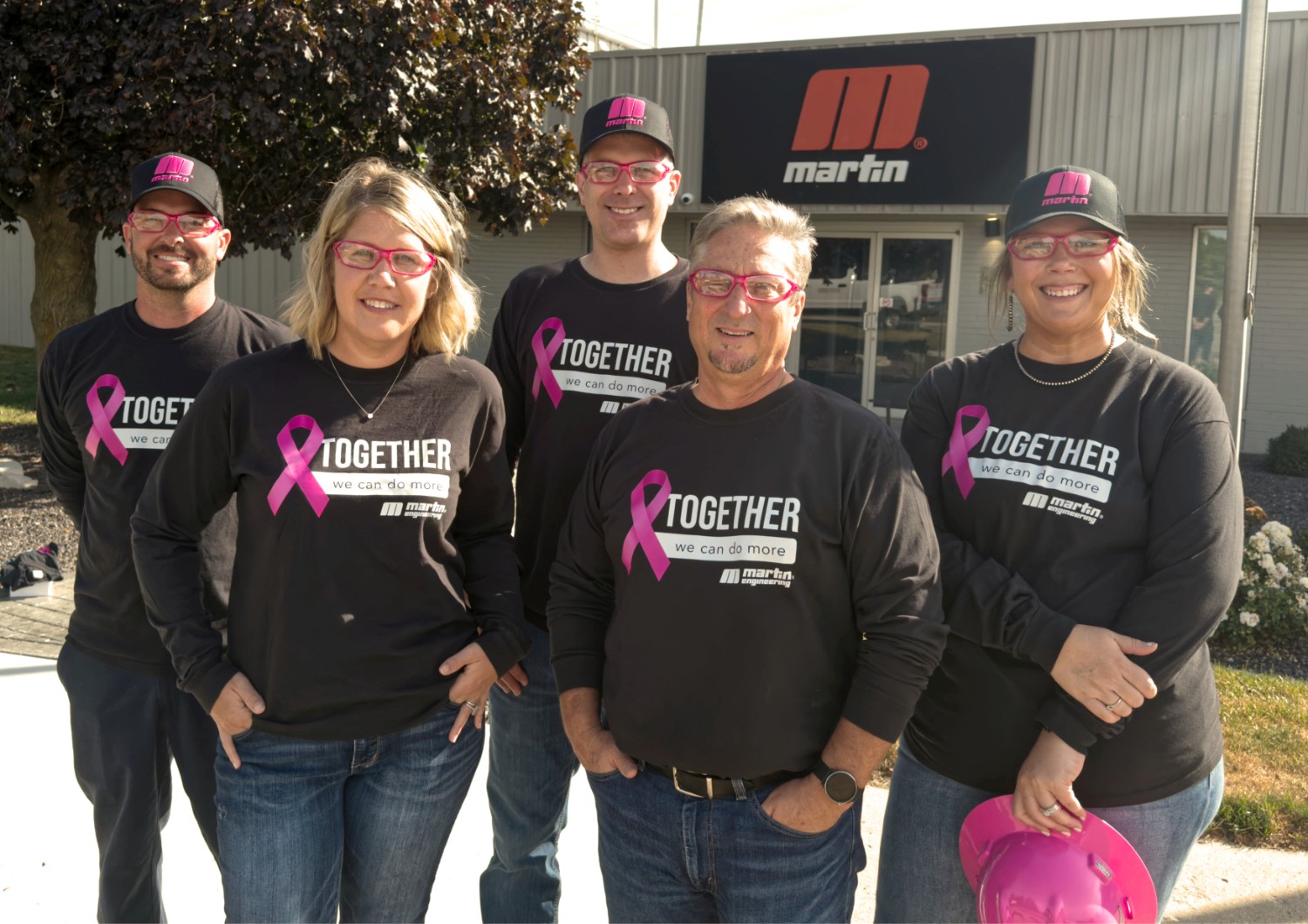 One of the many Martin Engineering teams gear up with pink PPE to support the initiative.