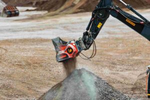The ALLU Concrete Bucket has been developed to address these operational challenges by allowing contractors to crush and screen demolition material using the excavator already operating on the jobsite.