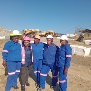 Dorah (second from the right) with some of her colleagues who are thriving in the dimension stone mining industry.